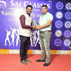 Another one of our expert faculty members being recognized for his hard work and dedication at our annual farewell and alumni meet.
