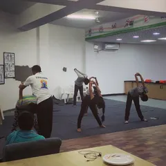 Our yoga guru provides individual attention, ensuring each shooter performs the asanas correctly for maximum benefit and injury prevention.