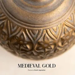A close up look at the antique gold finish of our Medieval Gold glaze. Notice how it settles into the carved textures, creating depth and highlighting the craftsmanship of the piece.