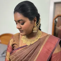 A close-up of the soft brown tones on the eyes and lips for my client Subha. The makeup is subtle, enhancing her features without looking heavy.