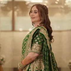 A candid moment of pure happiness from an engagement celebration. I created this soft glam look with radiant skin and gentle contouring to complement her beautiful green lehenga, ensuring she looked and felt effortlessly elegant.