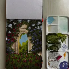 A gouache painting of a secret garden archway, with my paint palette alongside.