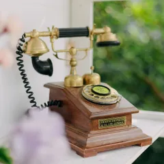 A vintage rotary telephone used as a prop for a retro-themed Mehendi. It's these unexpected, charming details that bring a theme to life and delight guests.