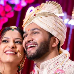 Amidst all the rituals, these moments of pure, shared laughter are priceless. I'm always ready to capture these candid expressions that show the true joy of the day.