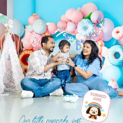 Our little cupcake just turned one. Capturing the messy, joyful, and loving moments of a first birthday cake smash with the whole family is what it's all about.