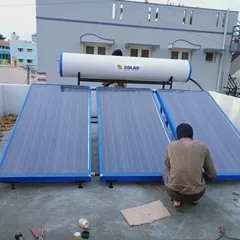 Our installation team at work, handling the plumbing and final connections for a 300L FPC system. We manage the entire process to ensure a secure and efficient setup on your flat concrete rooftop.