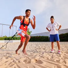 We take training beyond the court with specialized tools like our sandpit. This resistance training is incredibly effective for building lower body strength, explosive power, and ankle stability, giving our athletes a significant physical advantage.