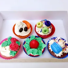 A box of my assorted cupcake soaps, ready to be gifted. This set includes a variety of designs, from floral topped to coffee bean sprinkled, showcasing the different styles I can create for custom orders or workshops.