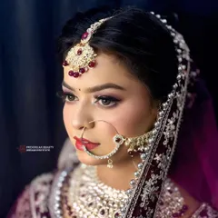 The side profile shows the complete harmony of the makeup, hair, and jewelry. Every angle is your best angle with my detailed bridal artistry.