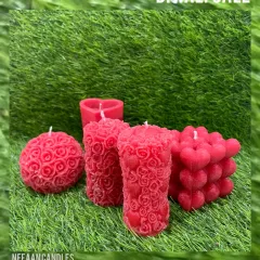 Light up your Diwali with our handcrafted designer candles. This collection of red candles, featuring rose pillars, a rose ball, and a heart bubble cube, is perfect for adding a warm festive glow.