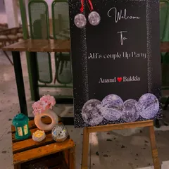 A personalized welcome sign for Anand and Bakkia's pre-wedding party. The disco ball theme was carried through all the design elements.
