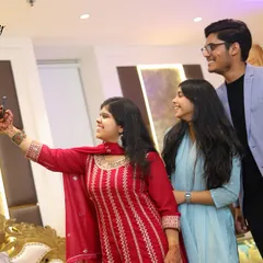 Capturing friends having fun together is what it's all about. This candid shot shows a group of guests taking a selfie, perfectly documenting the social and interactive nature of a get-together.