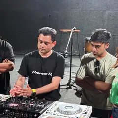 Explaining the signal flow and creative possibilities of the AlphaTheta Euphonia mixer to an engaged group. These small-group settings ensure everyone gets a chance to interact with the gear.
