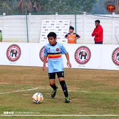 A player from our academy dribbling the ball during a Football Delhi Golden League match. Participation in such leagues is key to player development and exposure.