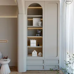 A conceptual design detail showing an arched, built-in shelving unit. We explore how architectural forms can be integrated into cabinetry to create storage that is both beautiful and unique, with soft backlighting to highlight decorative objects.