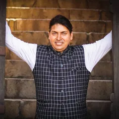 A welcoming pose. My goal as a magician is to open the door to a world of imagination and fun for my audience.