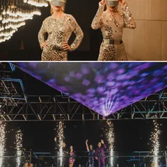 More moments from the celestial party. The top image shows greeters in futuristic silver outfits, while the bottom captures the couple's grand entrance on stage amidst sparklers.