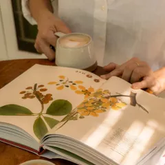 A perfect afternoon looks a lot like this: a warm cup of coffee, a beautiful book, and a quiet moment to yourself. We’ve partnered with Champaca Books to fill our shelves, so you can always find a new story to get lost in.
