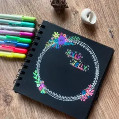 The "Holly Jolly" season is here! A festive wreath doodle to celebrate the Christmas spirit.