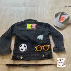 Another custom denim jacket for a child, this one with a soccer ball and diamond patch. The name on the back and the initial on the cap are fully customizable.