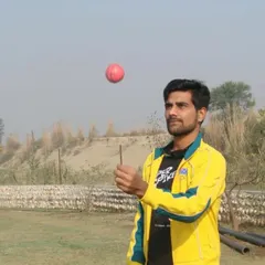 A spinner tossing the ball during practice. We teach the subtle arts of flight, dip, and turn, helping our spin bowlers become potent weapons in any match.