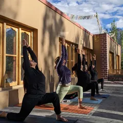 Here is a glimpse of our morning practice during a nature retreat. We gather outdoors, with prayer flags fluttering above, to greet the day with movement and gratitude. Practicing together in a small group creates such a supportive and loving energy.