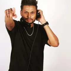 A classic DJ pose. With headphones on and pointing at the camera, I'm ready to bring the party to you.