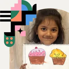 A sweet smile with her sweet creations. This artist used watercolors to paint her cupcakes before adding the final touches.
