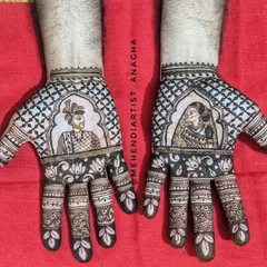 Grooms deserve beautiful mehendi too. Here, I created custom portraits of the bride and groom, a unique way to celebrate their union right on their hands.