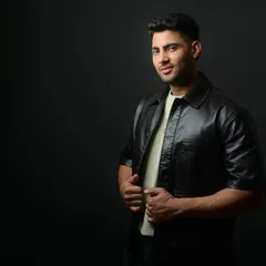 A stylish portrait for a fitness enthusiast. Even when clothed, the right pose and lighting can hint at a strong physique, creating a cool and confident look.