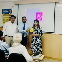Being recognized for my hard work is always an honor. Here I am receiving an award for my performance, a moment that fuels my drive to continue delivering dedicated service and achieving results for my clients.