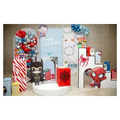 A wide view of our 'baby superheroes' party setup. It features adorable, kid-friendly versions of Batman, Spider-Man, and Superman against a comic-book-style backdrop.