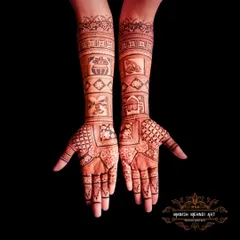 A beautiful example of traditional bridal mehndi. The arms are covered in classic motifs and patterns that tell a story, a style that is timeless and always in demand for weddings.