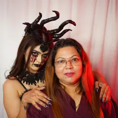 A chillingly beautiful dark fantasy look, created with my student. This photo showcases the SFX makeup, including the bloody tears and dark veins, and the custom headpiece that completes the character.
