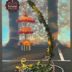 For a truly spectacular wedding or engagement, I designed this breathtaking chandelier cake. The tiers hang elegantly from a custom stand, adorned with crystals and fresh flowers, creating an unforgettable centerpiece that tastes as good as it looks.