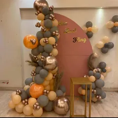 This is another example of our custom decoration services. We designed this stylish backdrop with a balloon arrangement for a 'One Last Fling' party, helping create a fun and memorable theme for the celebration.