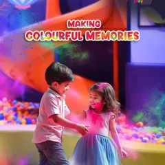 Making colorful memories together! The joy of Holi is captured as two children play with safe, organic colors in our play area. It’s all about laughter, friendship, and festive fun.