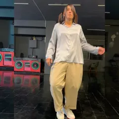 An instructor demonstrates the precision required for popping drills. Mastering these foundational movements is everything. It's the difference between a move that looks cool and a move that feels right.