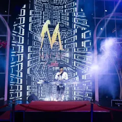 The combination of smoke effects, a massive LED screen, and intricate lighting design creates a truly immersive environment.