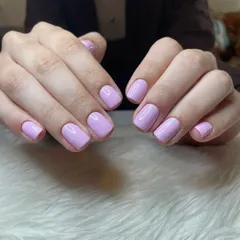 Pastel perfection. A simple, clean manicure using a beautiful pastel lavender gel polish on short, neatly shaped square nails. A perfect look for everyday elegance.