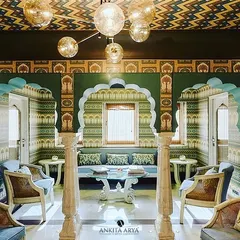 For the Surya Haveli in Jaipur, I designed a series of wallpapers that echo the city's royal heritage. This space features custom arches and patterns inspired by traditional Rajasthani architecture, creating an immersive, palatial experience.