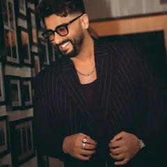 For the premiere of "Bastards of Bollywood" on Netflix, I styled Arjun Kapoor in this sharp pinstripe suit. The goal was to create a look that was both dapper and modern, reflecting his cool and confident personality.