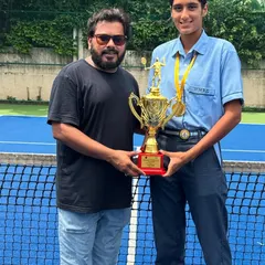 Presenting the team trophy to one of our CBSE Cluster Championship winners. These victories are a result of the strong partnership between our academy and M.M. Public School.