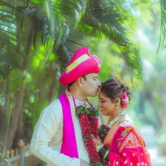 A tender kiss on the forehead is a simple, beautiful expression of love. This candid shot of Pratiksha and Nitesh captures the gentle affection between the couple on their wedding day.