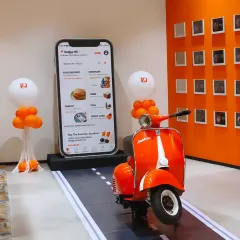 I was proud to partner with Swiggy to celebrate their 10th anniversary. This photo booth, featuring a life-sized phone screen and a classic scooter, was a huge hit at their corporate awards event. It shows my capability to design and execute creative concepts for major brands.