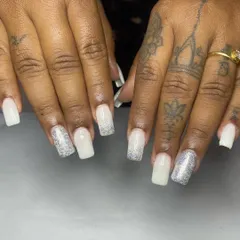 A popular choice for modern brides, these square-shaped extensions feature a milky white base with a holographic glitter gradient. I teach you how to achieve this soft yet sparkling look.