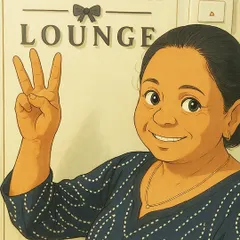 A portrait of a smiling team member, whose hard work and positive spirit are a huge part of what makes Hamper Lounge special.