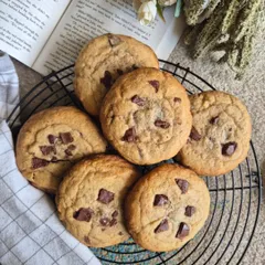 A classic shot of my chocolate chip cookies cooling on a wire rack. This is when the house smells the best. You can see the generous amount of chocolate chunks in each one.