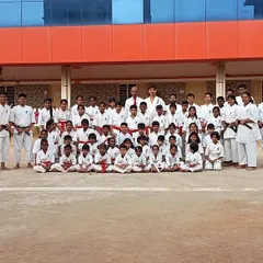 A large group photo from our main dojo's belt grading exam. It is a proud day for students of all ranks, from red belts to black belts.