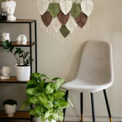 Where artistry meets nature. This macrame leaf hanging, styled in a modern bohemian room, blends soft fibers and earthy colors to evoke a sense of peace, warmth, and natural elegance.